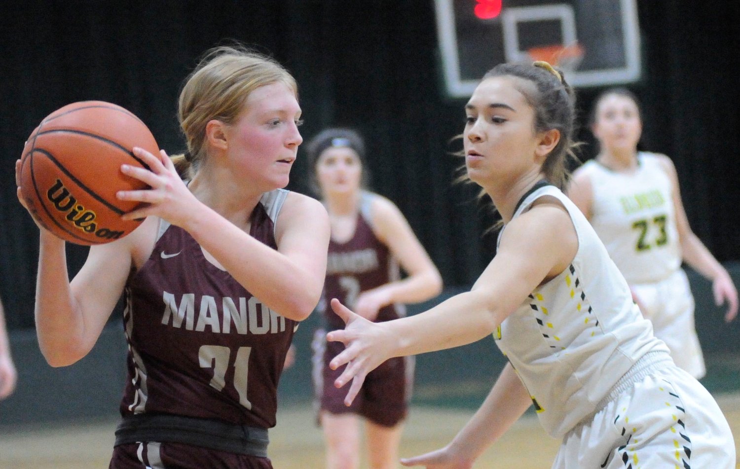 Face off. Manor’s Emma Carlson and Eldred’s Jailyn LaBuda,